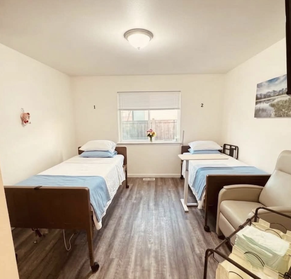 Furnished residence care room with wheelchair access