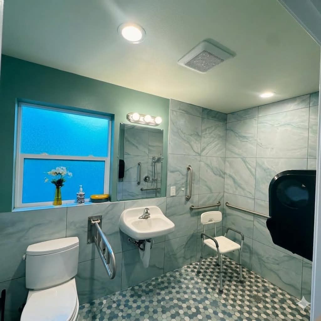 Accessible bathroom with grab bars and safety seat