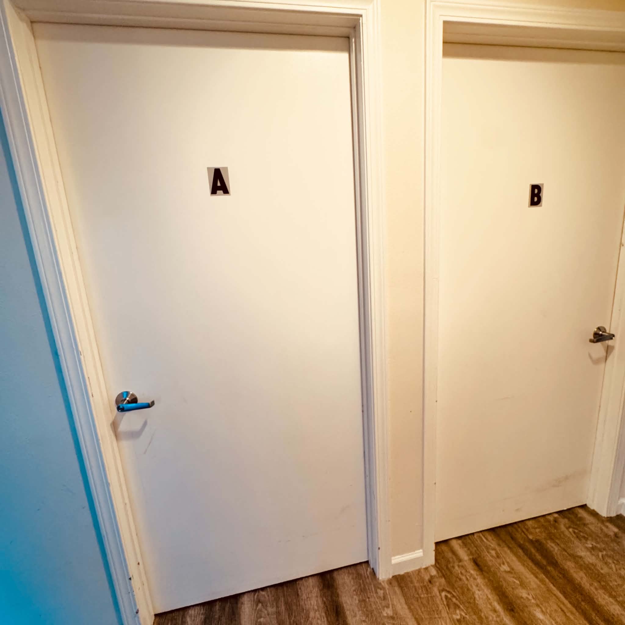 Interior hallway leading to resident rooms